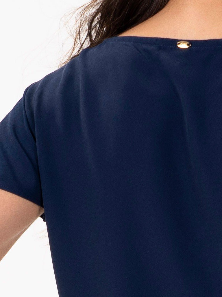 hilary detalhe costas vitrine