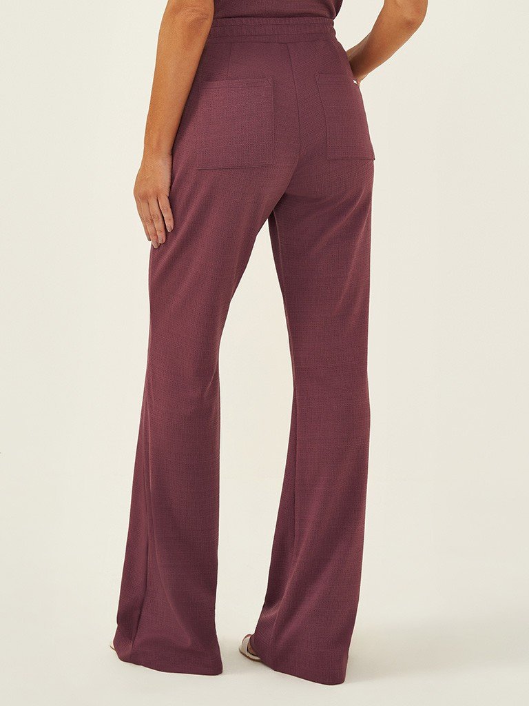 foto costas de perto calca katlin