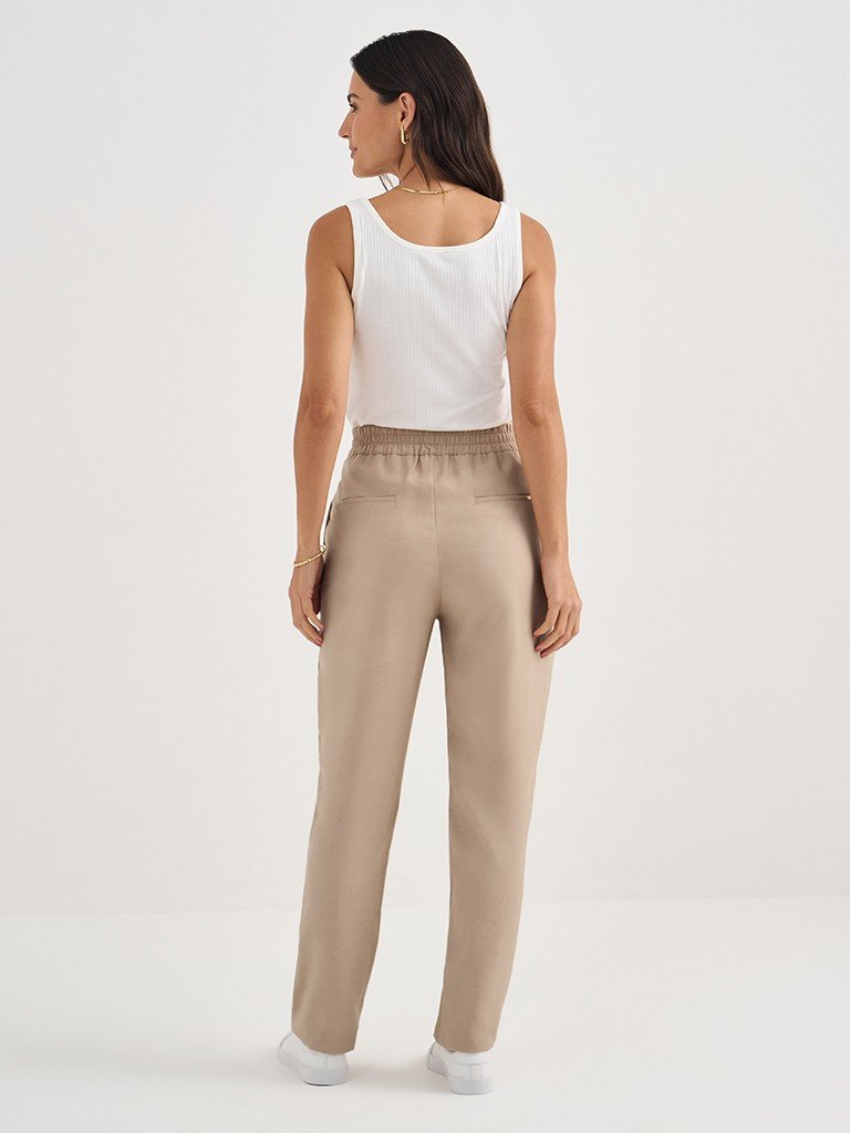 calca dalmira costas look inteiro