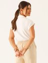 10501650 blusa manga curta decote v em viscose off white viviani 19200536 calca alfaiataria wide leg em viscose aveia vitoriana 1 2