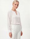 10501489 blusa de botao adriana 19200437 calca alfaiataria branca amanda 2